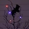 4ft. Pre-Lit Artificial Halloween Black Spooky Twig Tree with Bats and 120 Orange & Purple LED Lights